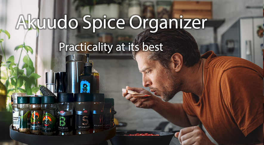A man tasting food and spice rack on the countertop