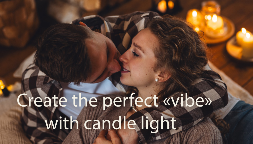 Couple kissing by candle light